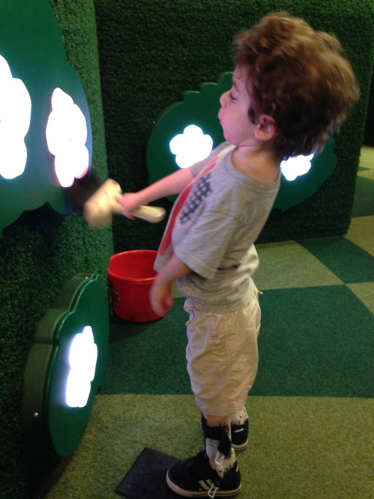 We had fun in Philly too at the Please Touch Museum.  This is a great image of how high Aleck can reach without using the wall for support or leaning way back.  
